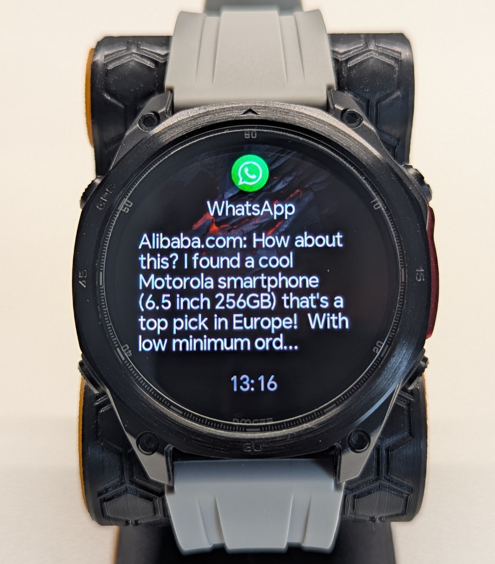 WhatsApp notification preview on the Anywise W1 Pro screen